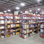 Multiple rows of Frazier's Sentinel Selective Pallet Racking stores product.