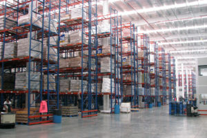 Multiple rows of Frazier's Sentinel® Selective Pallet Rack stores pallets of products.