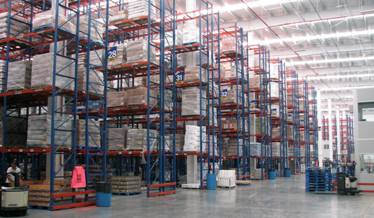 Multiple rows of Frazier's Sentinel® Selective Pallet Rack stores pallets of products.