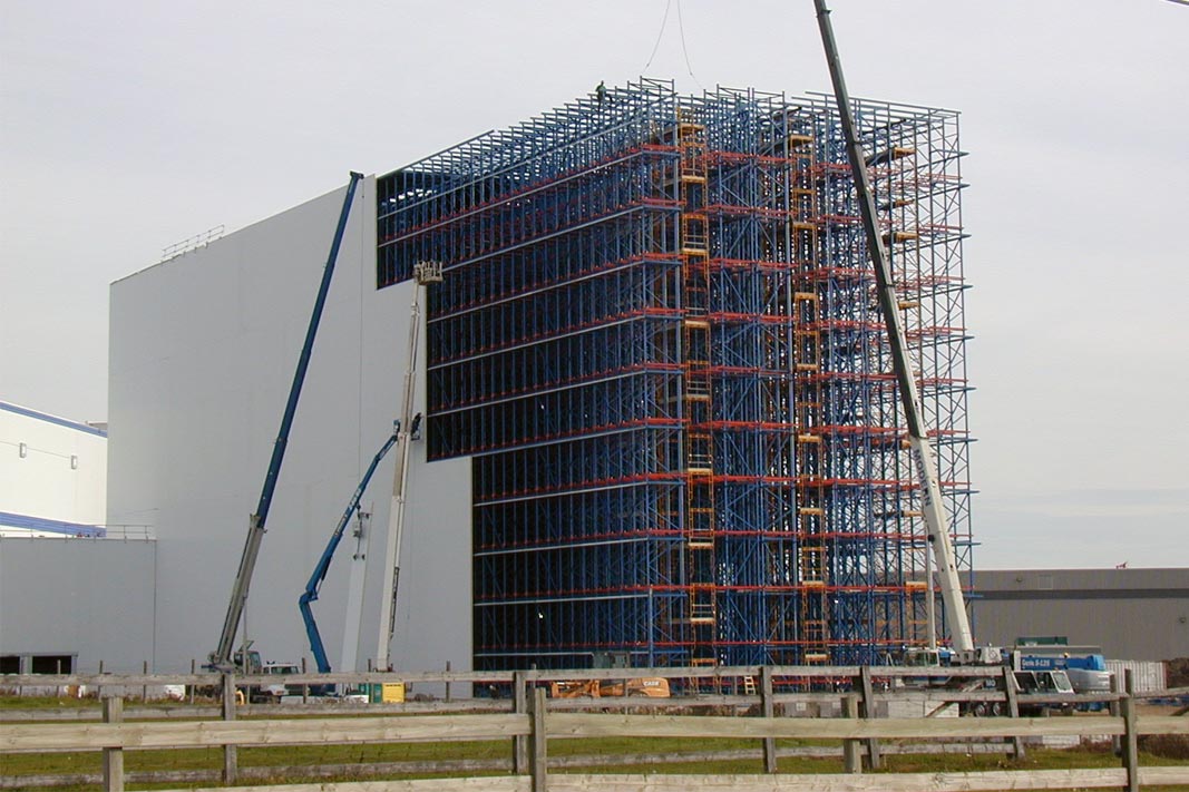 AS/RS cranes being installed in a Rack Supported Building.
