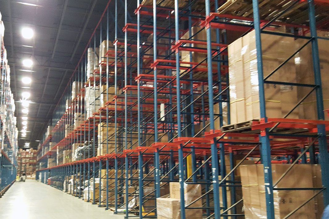 Drive-In pallet rack stores products.